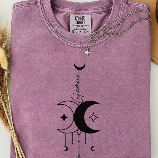 berry comfort colors shirt with a black celestial design and 'Gemini' text. 