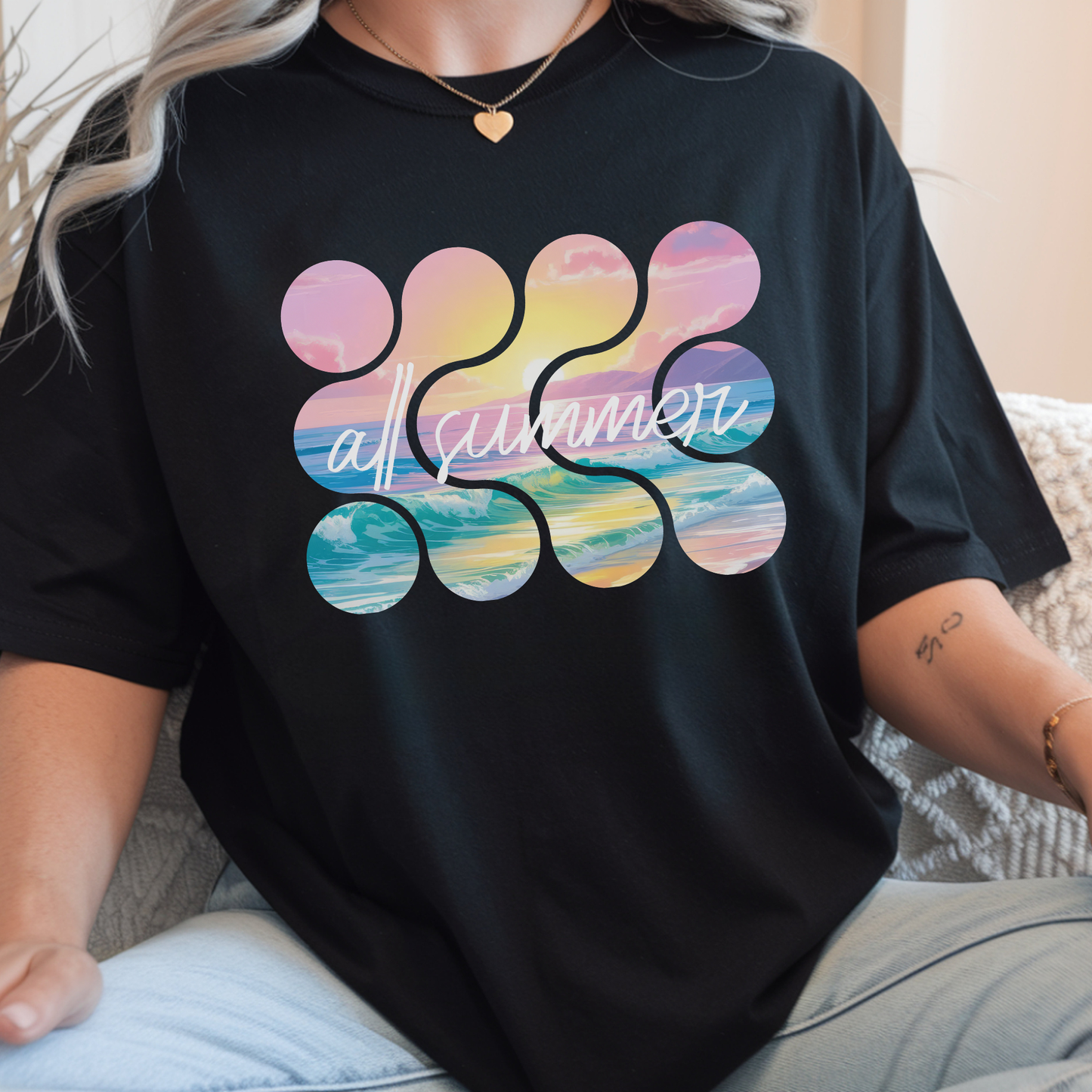black comfort colors t-shirt with colorful beach and sunset design along with 'all summer' text. 