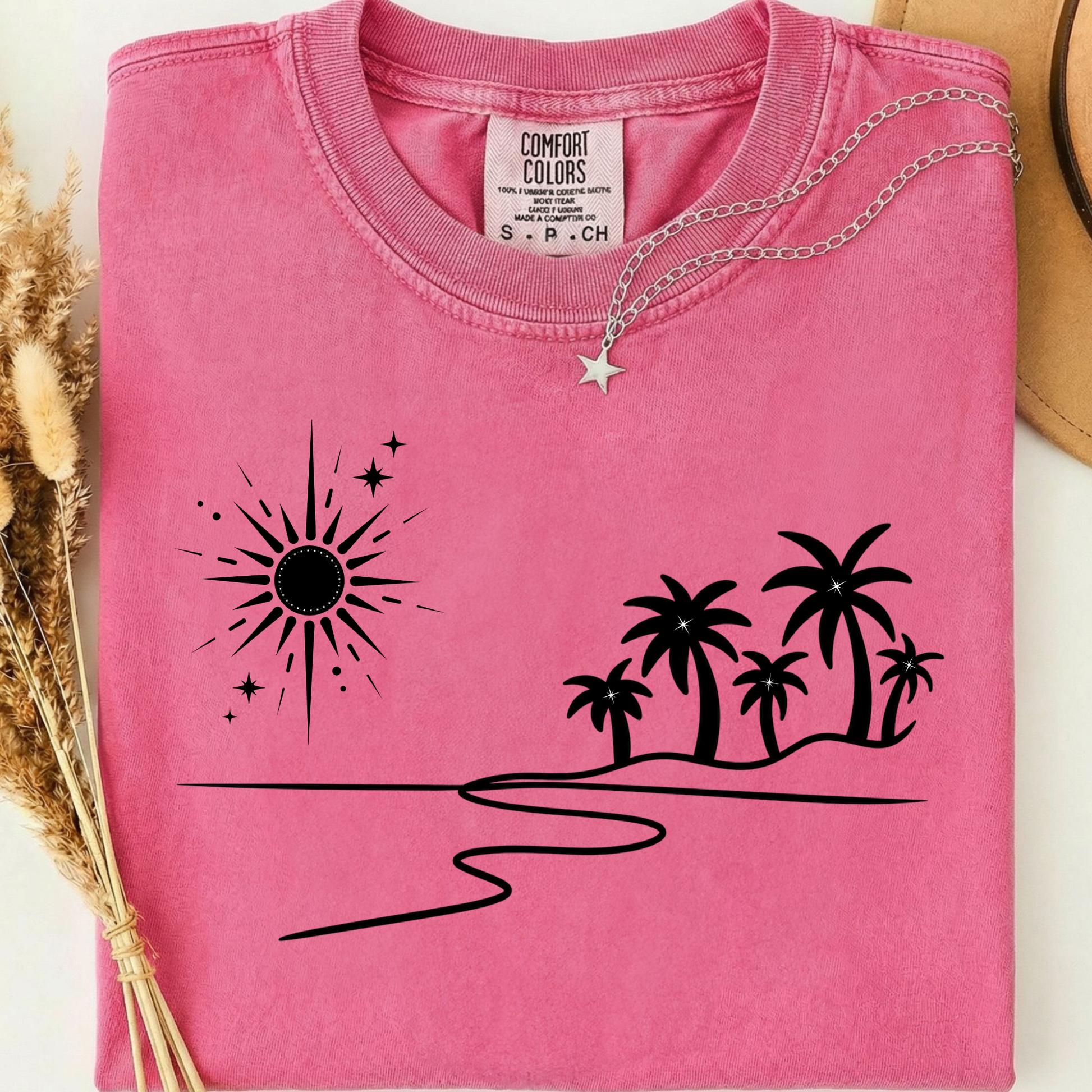 Pink comfort colors t-shirt with beach, sunset, celestial and palm trees design. 
