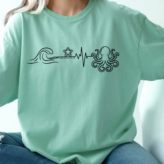 green island reef comfort colors t-shirt with ocean-themed, beach waves, heartbeat, starfish and Octopus design along with a minimalist 'Beach Pulse' text.