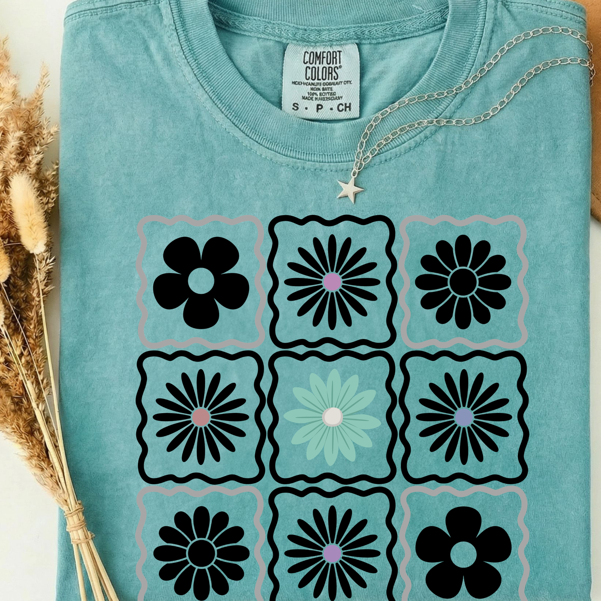 seafoam comfort colors t-shirt with floral pattern design. 