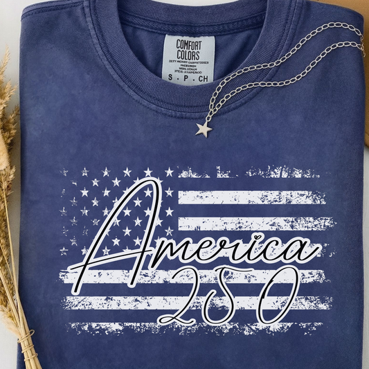 Navy blue comfort colors t-shirt with American flag design and 'America 250' text. 